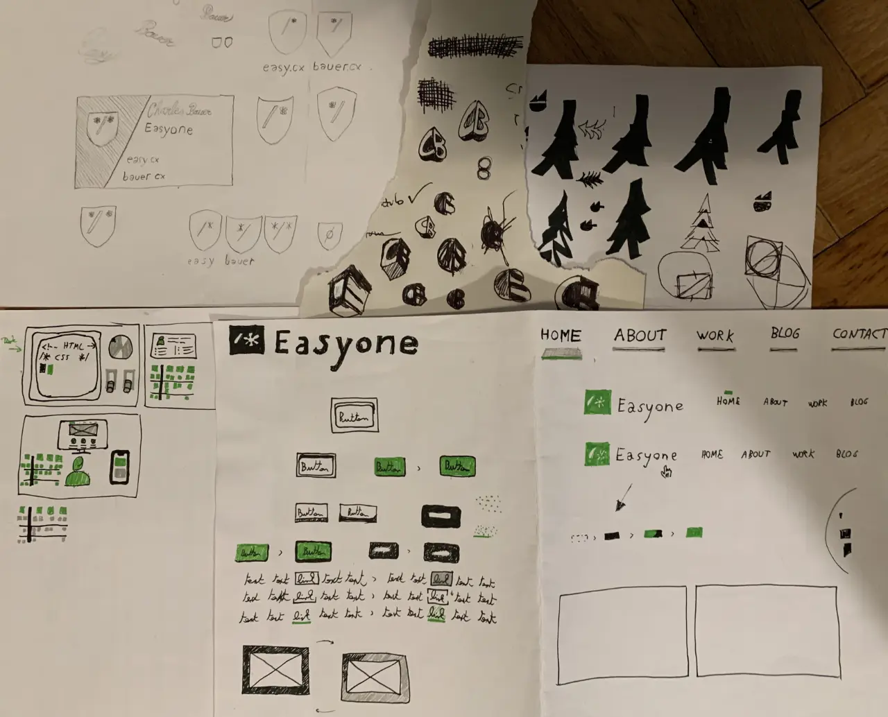 Scan of paper sketches with logos and UI elements.